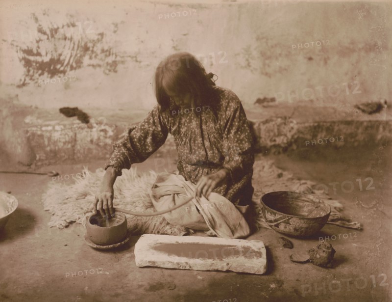 Zuni potter, c1903. Creator: Edward Sheriff Curtis.