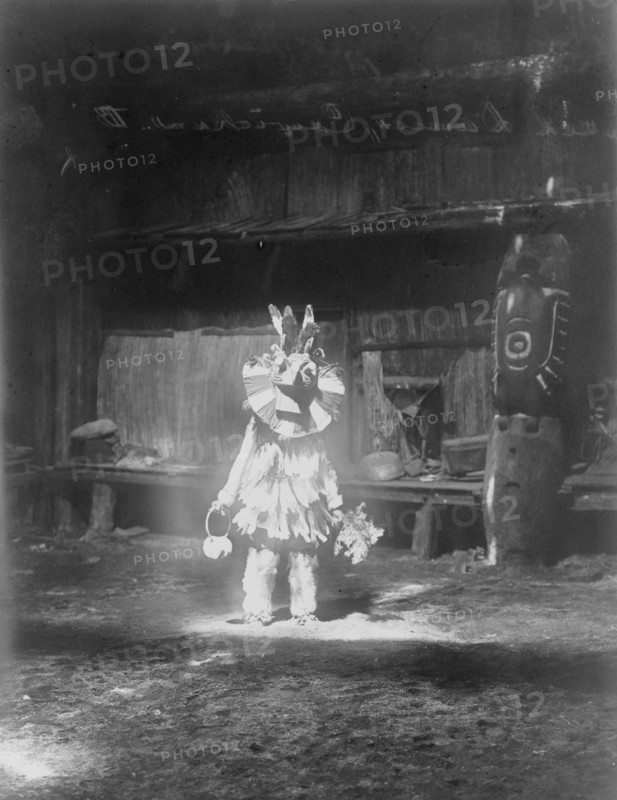 Masked dancer, Cowichan, c1913. Creator: Edward Sheriff Curtis.