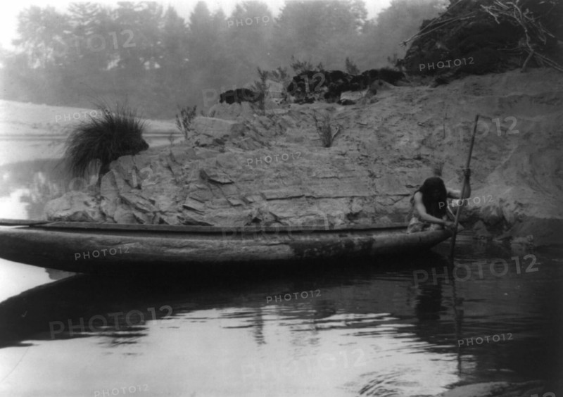 Fishing from canoe-Hupa, 1923. Creator: Edward Sheriff Curtis.
