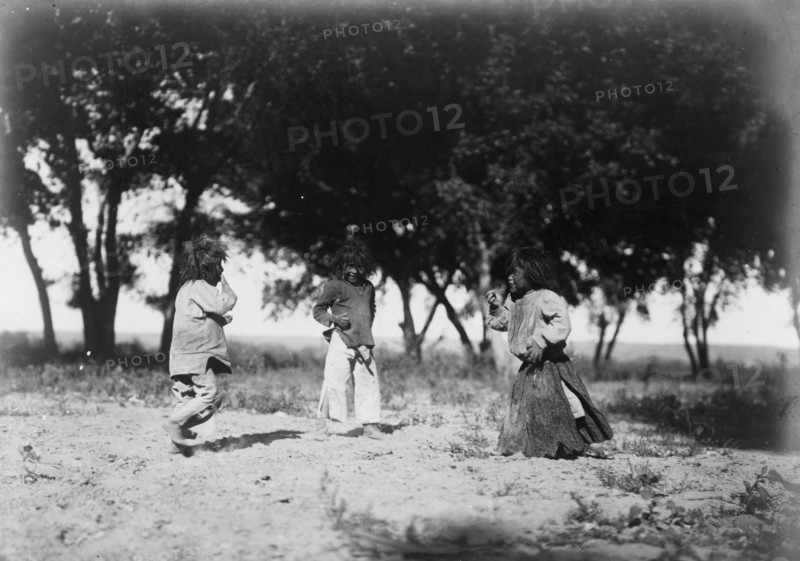 Child life, the cotton woods-Navaho, c1905. Creator: Edward Sheriff Curtis.