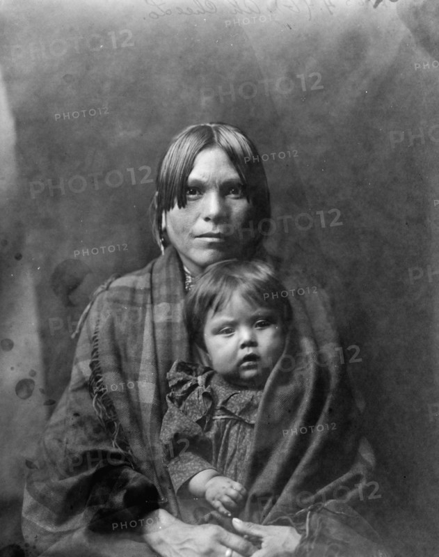 Babe and parent, c1905. Creator: Edward Sheriff Curtis.
