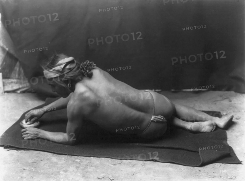 Grinding medicine-Zuni, c1903. Creator: Edward Sheriff Curtis.
