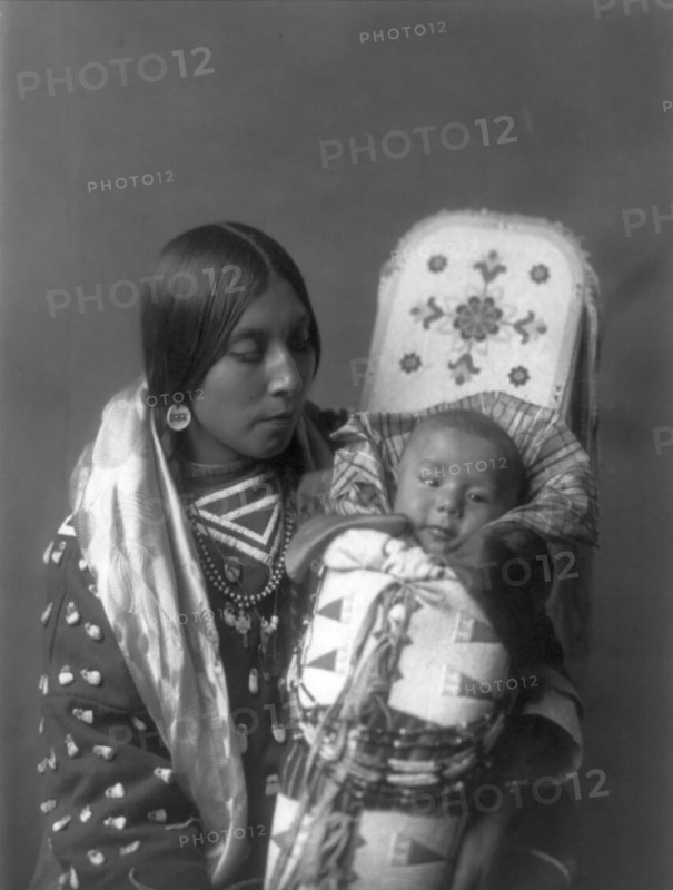Mother and child-Apsaroke, c1908. Creator: Edward Sheriff Curtis.