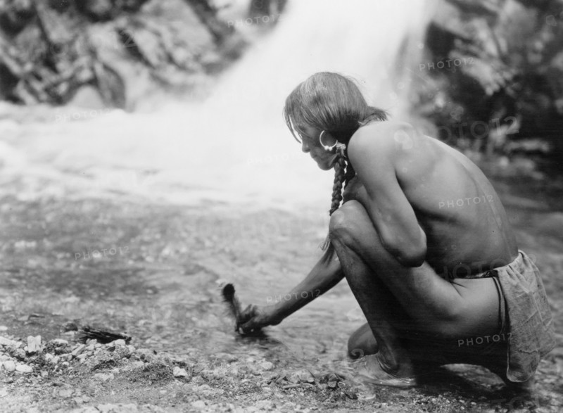 An offering at the waterfall-Nambe, 1927 Creator: Edward Sheriff Curtis.