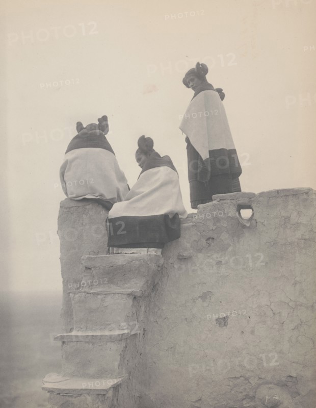 Three Hopi women at top of adobe steps, New Mexico, 1906, c1906. Creator: Edward Sheriff Curtis.