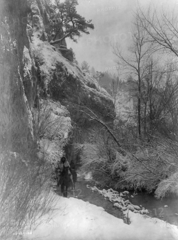 Passing the cliff-Apsaroke, c1908. Creator: Edward Sheriff Curtis.