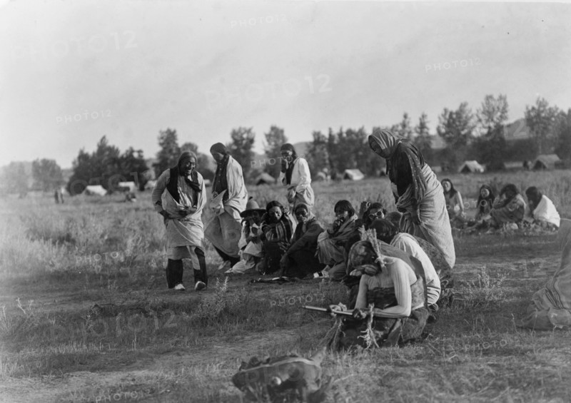 Priests passing before the pipe-Cheyenne, c1910. Creator: Edward Sheriff Curtis.