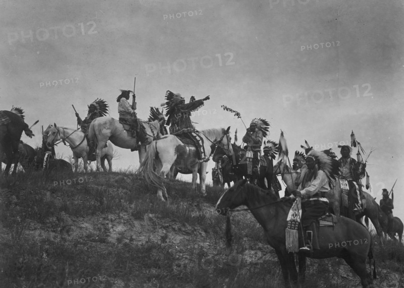 Planning a raid, c1907. Creator: Edward Sheriff Curtis.