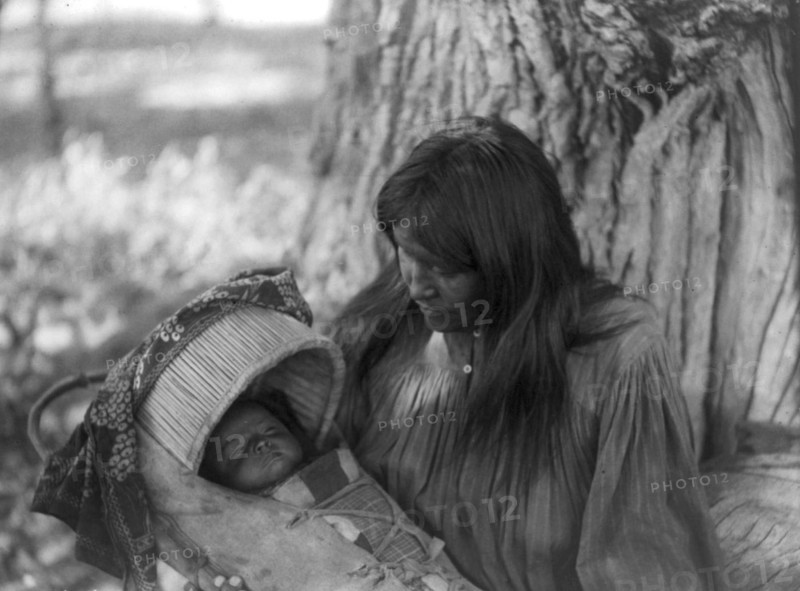 Mizheh and babe, c1906. Creator: Edward Sheriff Curtis.