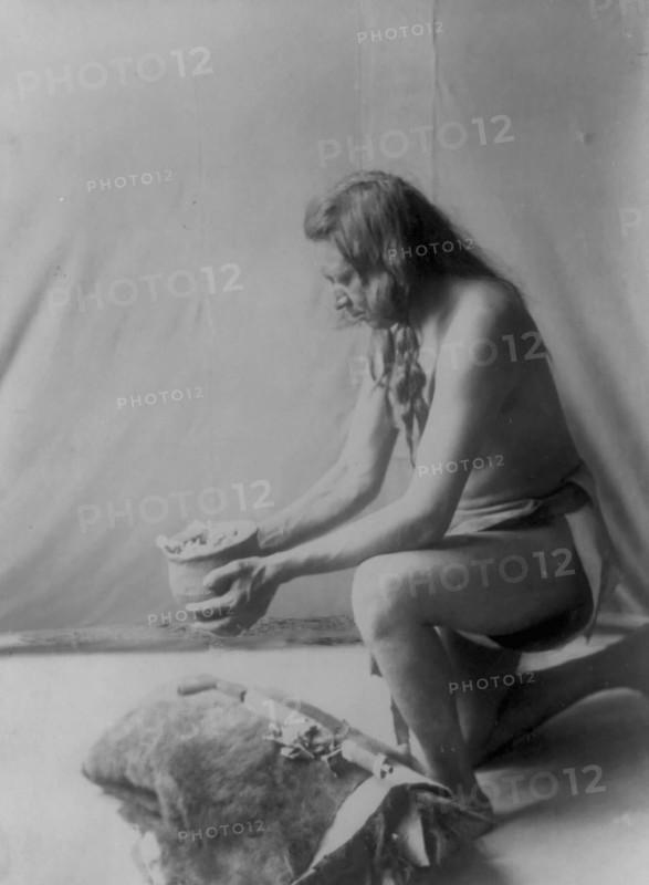 Incense over a medicine bundle, c1908. Creator: Edward Sheriff Curtis.