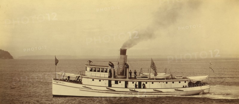 Port side view of small American ship, 1894 or 1895. Creator: Alfred Lee Broadbent.