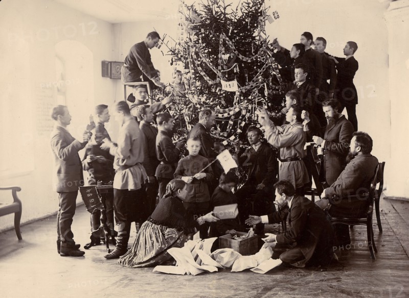 Decorating the Christmas tree at the Krasnoyarsk Teachers' Seminary, 1894. Creator: Lukhtanska.