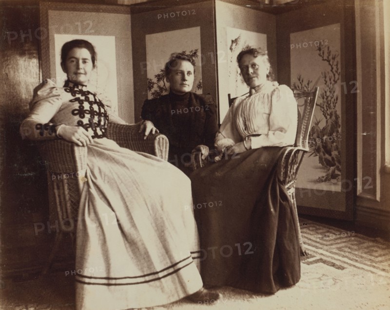 Three friends seated in the veranda room, Dom Smith, Vladivostok, Russia: Eleanor Pray..., 1899. Creator: Frederick S. Pray.