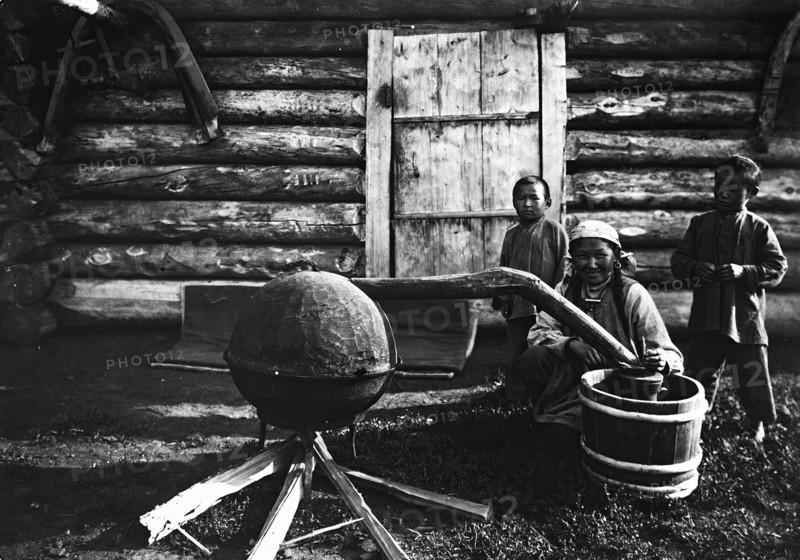 Woman preparing tarasun, 1890. Creator: Unknown.