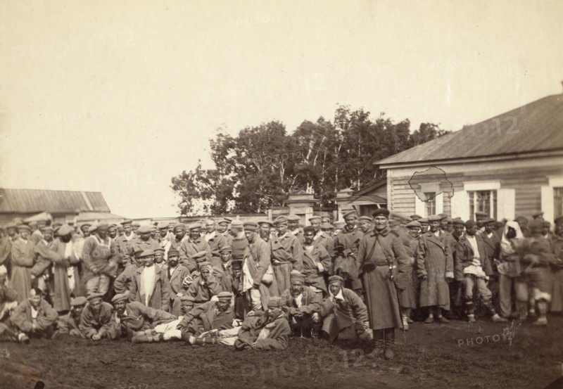 Group of convicts ready to embark on a prison barge, Tiumin [ie, Tiumen], between 1885 and 1886. Creator: Unknown.