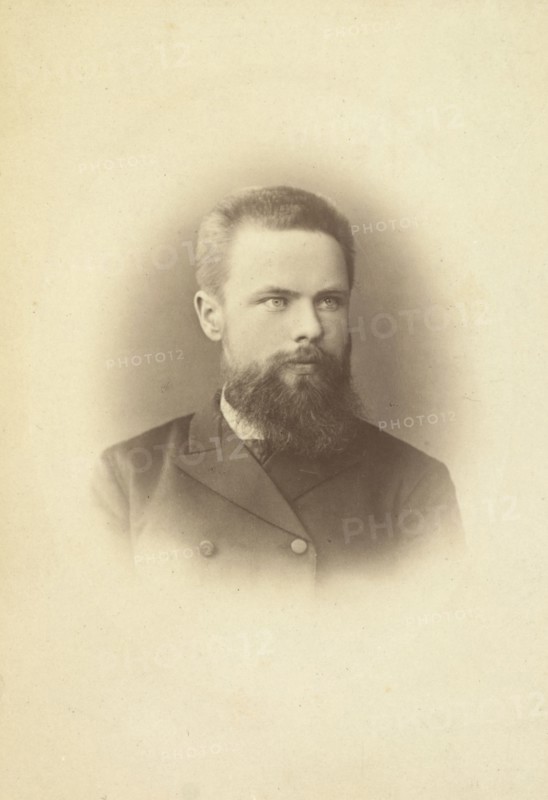 K Mikhailov, head-and-shoulders portrait, facing slightly right, between 1880 and 1886. Creator: Unknown.