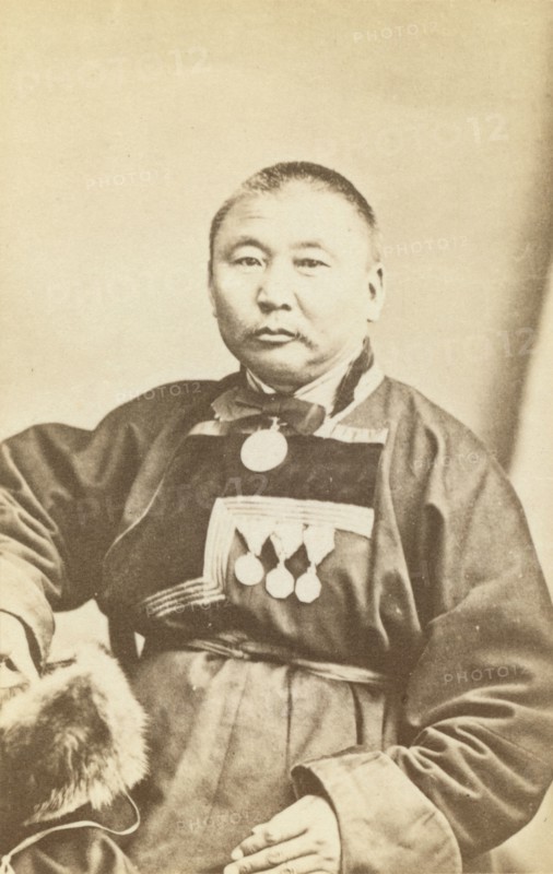 Half-length portrait of man, seated, facing slightly left, between 1870 and 1886. Creator: Unknown.