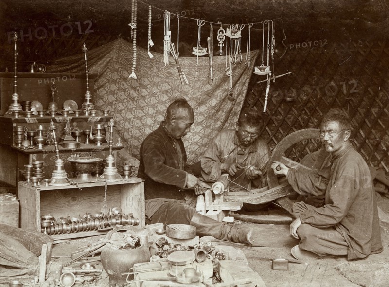 Buryat mechanics making "burkhanov" - Buryat goods, 1895-1939. Creator: L Veniukov.