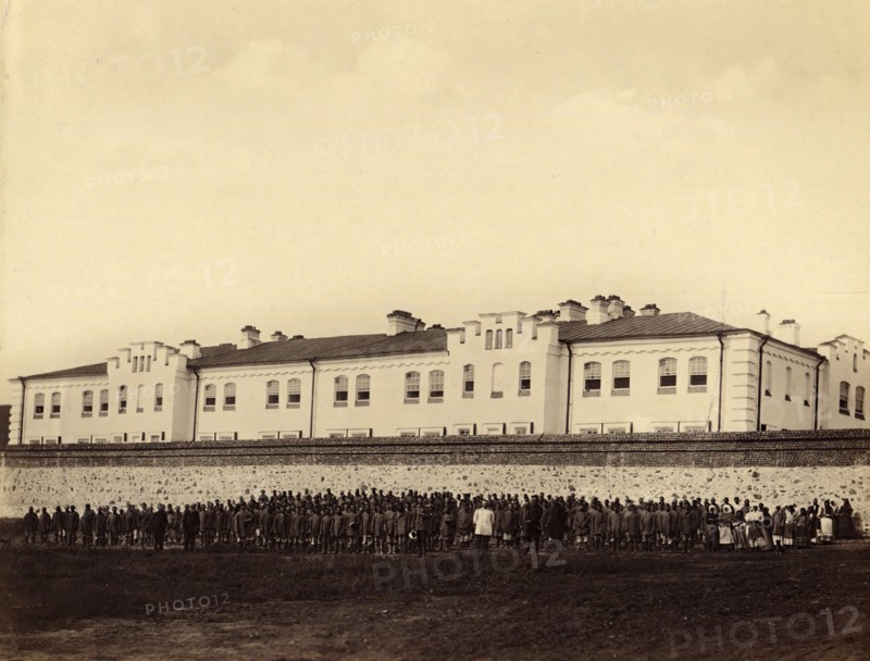 Internees Praying outside the Gornyi Zerentui Prison, 1891. Creator: Aleksei Kuznetsov.