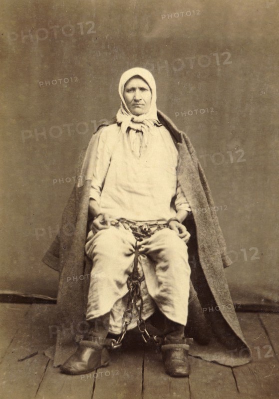 A Female Hard Labor Convict in Arm and Leg Shackles, 1891. Creator: Aleksei Kuznetsov.