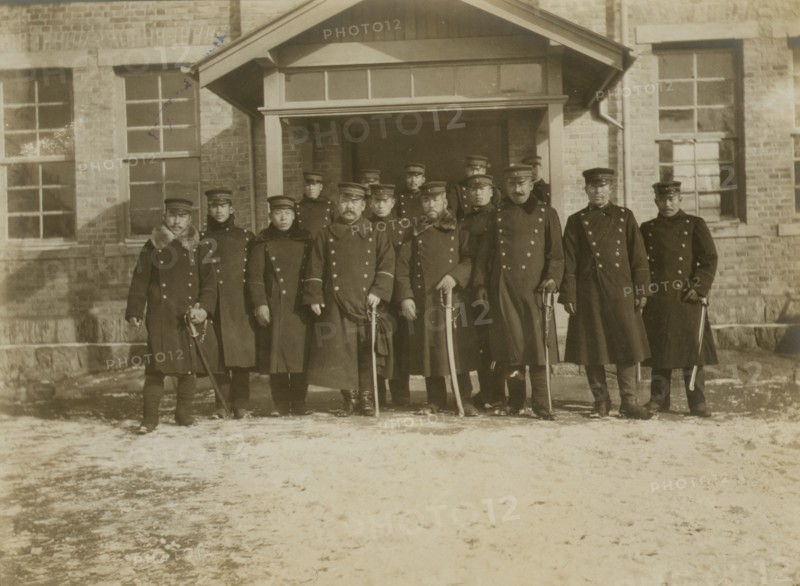 Group of Japanese officers in front of legation at Chemulpo, 1904. Creator: Robert Lee Dunn.