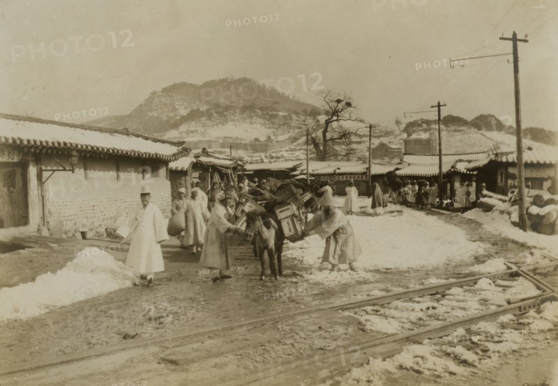 First arrival pack horses, Seoul, bound north, c1904. Creator: Robert Lee Dunn.