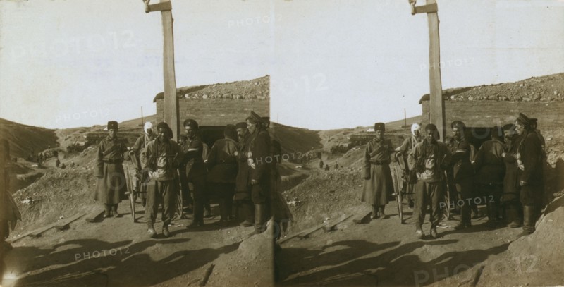 Carrying wounded Russian in a jinriksha from the front down to the hospital in Port Arthur, c1905. Creator: Underwood & Underwood.