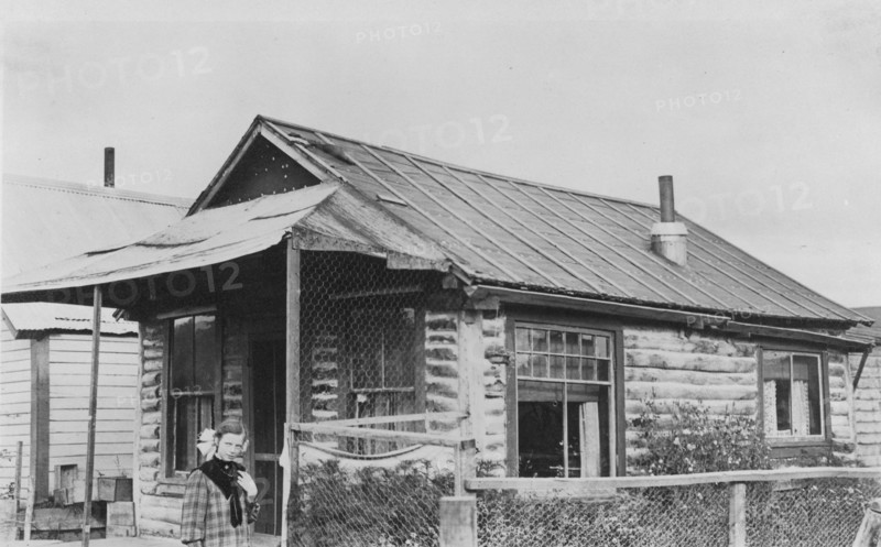 Log cabin, between c1900 and 1916. Creator: Unknown.