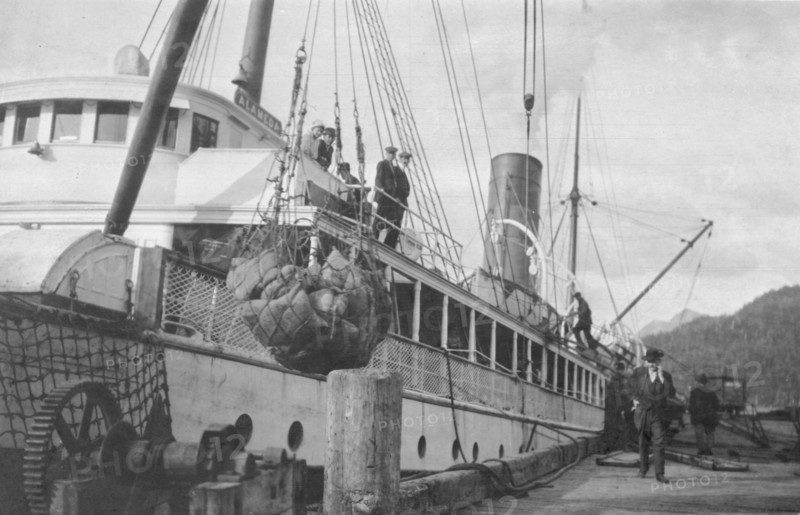 Loading copper on ship, between c1900 and 1916. Creator: Unknown.