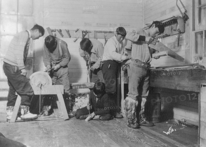 Eskimos doing carpenter work, between c1900 and c1930. Creator: Unknown.