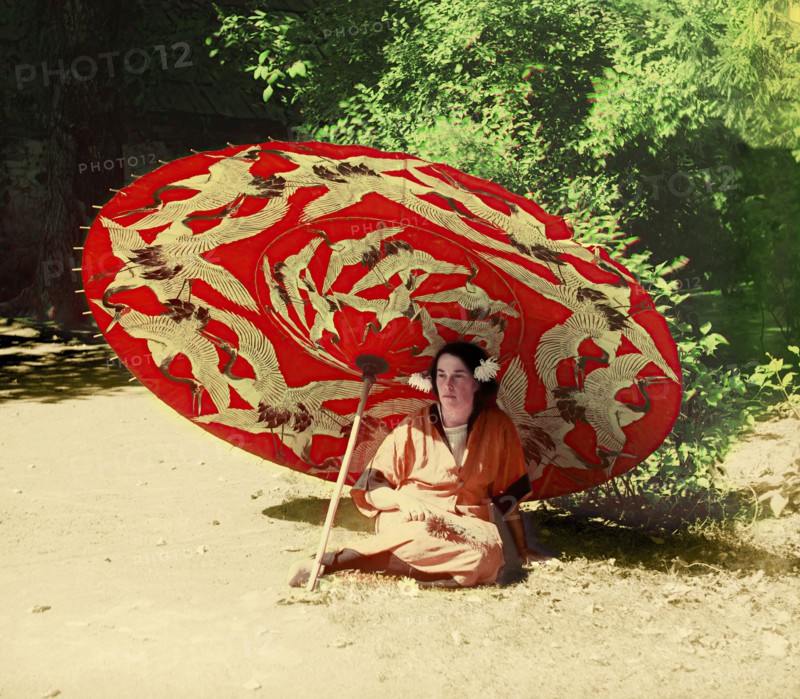 Woman sitting under a parasol, between 1905 and 1915.  Creator: Sergey Mikhaylovich Prokudin-Gorsky.