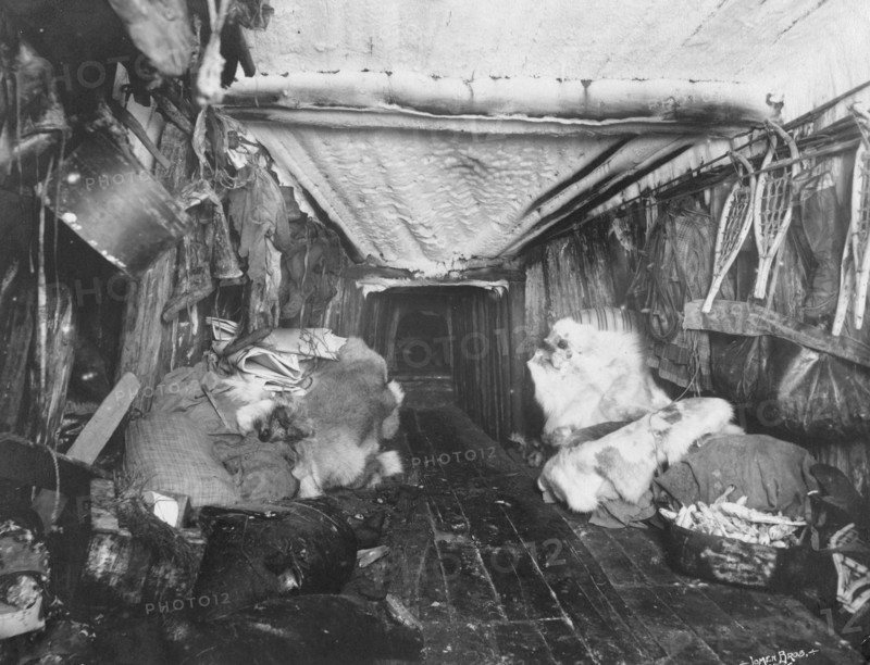 Interior of Eskimo hut, 1916. Creator: Lomen Brothers.