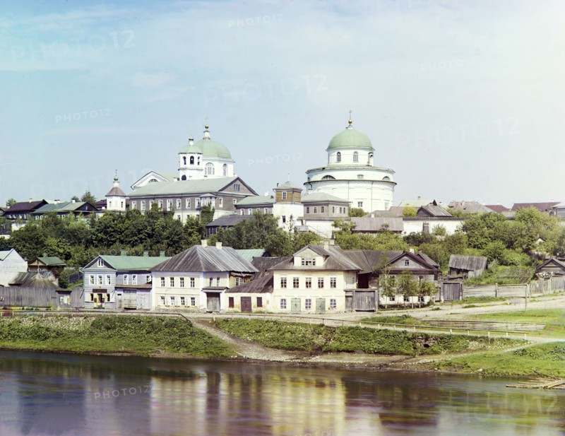Torzhok, embankment of the river Tvertsa. In the distance, the Resurrection Monastery, 1910. Creator: Sergey Mikhaylovich Prokudin-Gorsky.