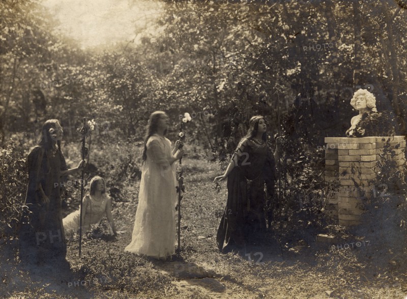 Briner sisters (from right to left) Nina, Maria, sitting on the ground Ekaterina Kornakova, 1914. Creator: Unknown.