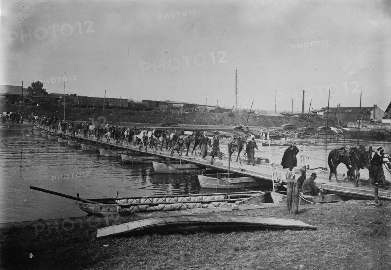 Spahis cross boat bridge, Compiegne, 1914. Creator: Bain News Service.