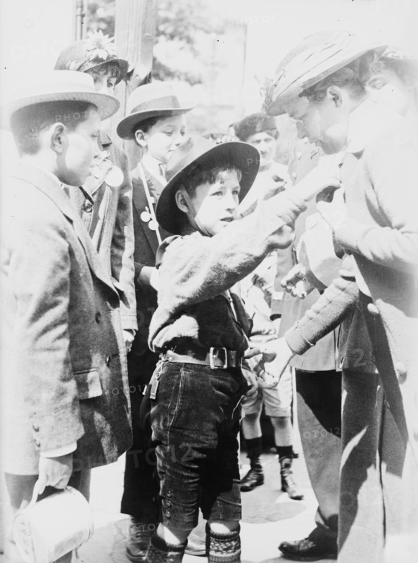 Boy Scout, Paris, Selling "Journee Francaise" Medals, between 1914 and c1915. Creator: Bain News Service.