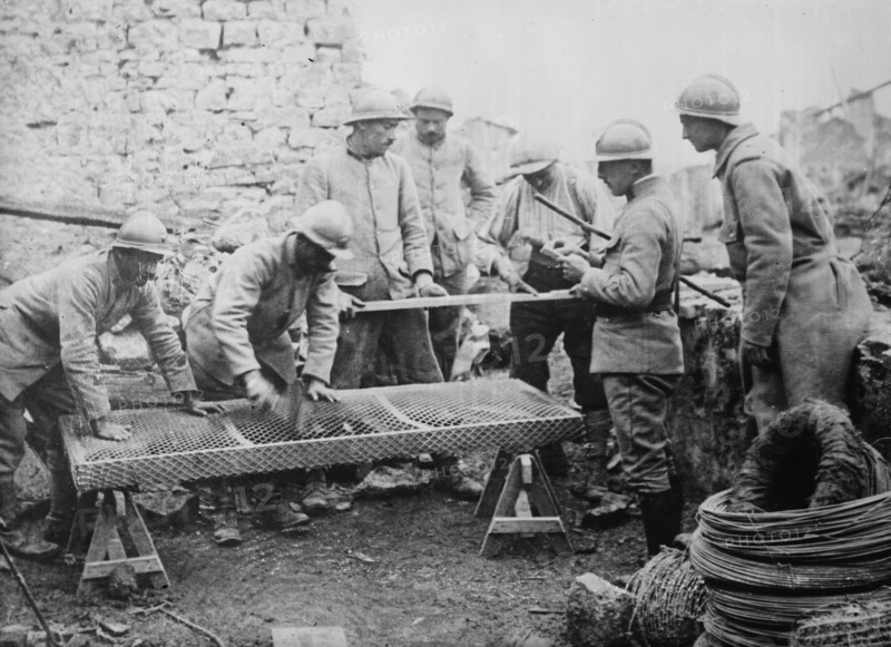Poilus making mattresses, between c1915 and c1918. Creator: Bain News Service.