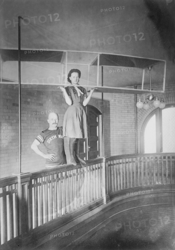 Woman in aeroplane ready for swimming, Pittsburgh, 1910. Creator: Bain News Service.