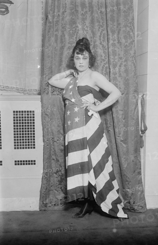 Alice Brady [draped in Old Glory], between c1915 and c1920. Creator: Bain News Service.