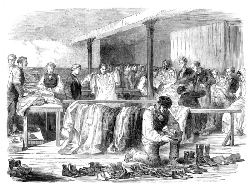The Cotton Famine: the Manchester and Salford Provident Society distributing clothing, 1862. Creator: Unknown.