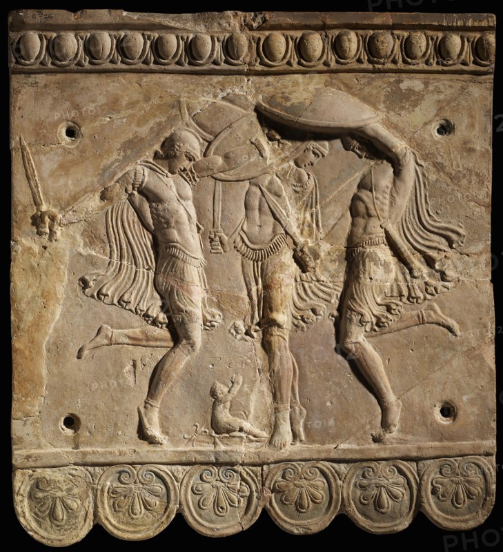 Corybantian dance. Terracotta Campana relief: three Curetes with swords and shields..., 50 BC-100. Creator: Classical Antiquities.
