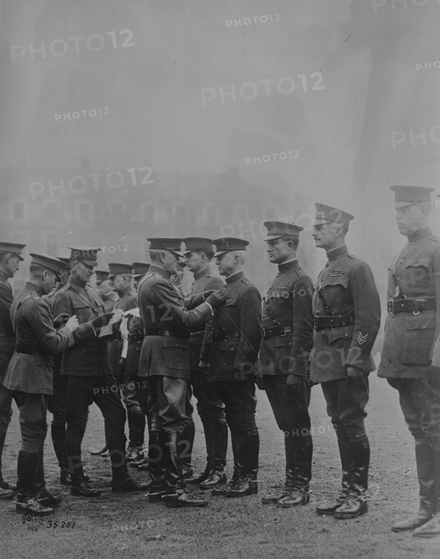 Pershing decorating Americans, Feb 1919. Creator: Bain News Service.