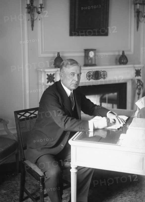 F. Lowden, seated at desk, writing, 1919. Creator: Bain News Service.