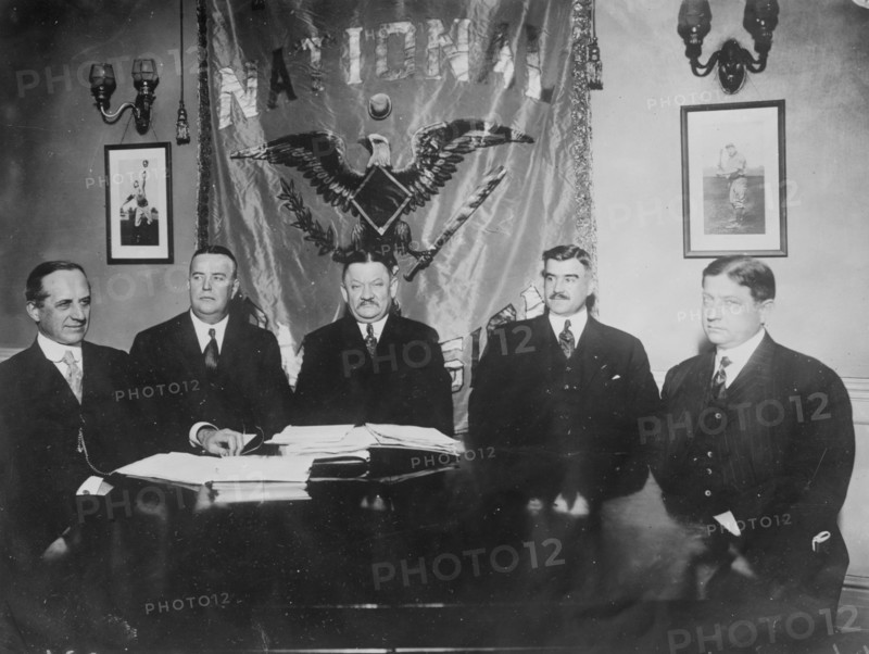 J.E. Bruce, Ban Johnson, A. Herrmann, T.J. Lynch, J.A. Heydler at table together, 1910. Creator: Bain News Service.