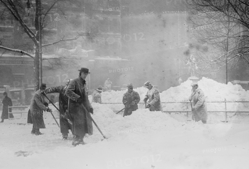 Shovelling snow in City Hall Park, New York, 1910. Creator: Bain News Service.