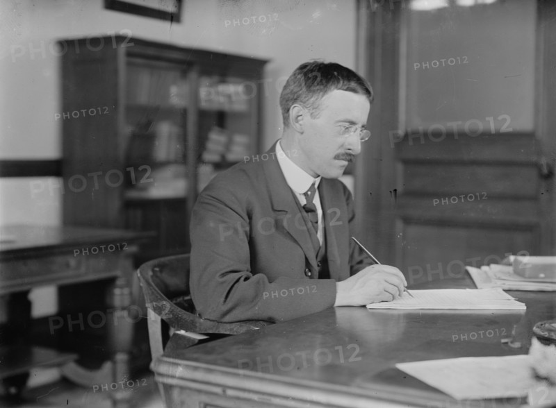 H.L. Stimson at desk writing, 1910. Creator: Bain News Service.