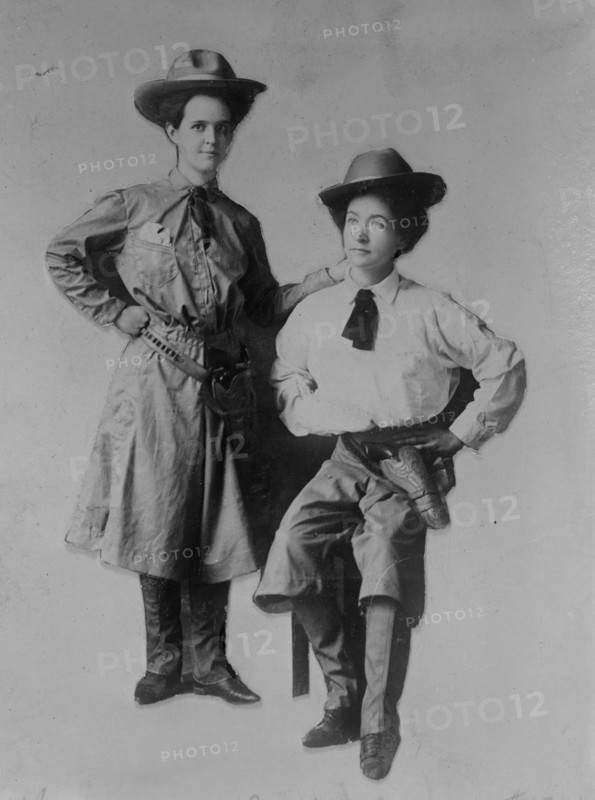 Mrs. Bessie Jenkins and Mrs. Cary Seely dressed up in cowboy outfits, 1910. Creator: Bain News Service.