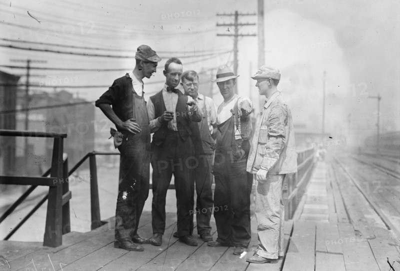 Penn. R.R. [i.e., Railroad] men talk strike, 1910. Creator: Bain News Service.