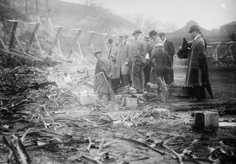 New York, NL & Philadelphia, NL players view fire damage, Polo Grounds, 1911. Creator: Bain News Service.