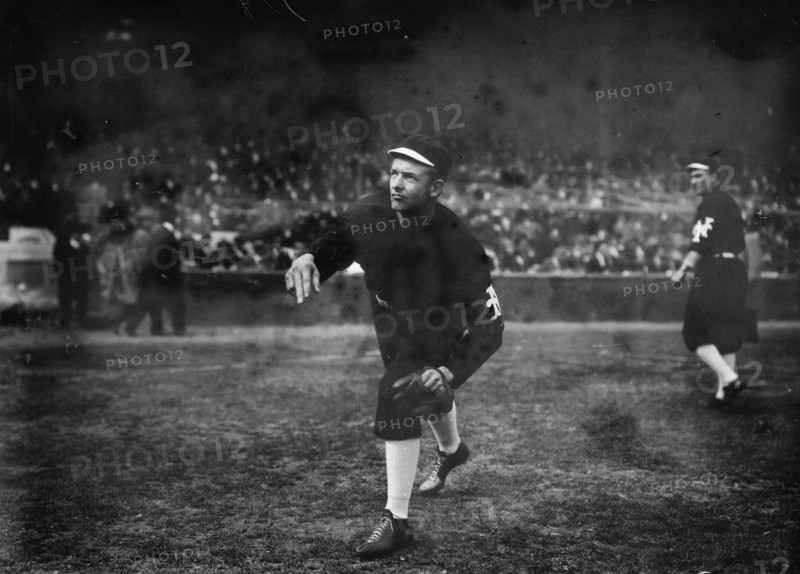 Christy Mathewson, New York, NL - World Series warm up (baseball), 1911. Creator: Bain News Service.